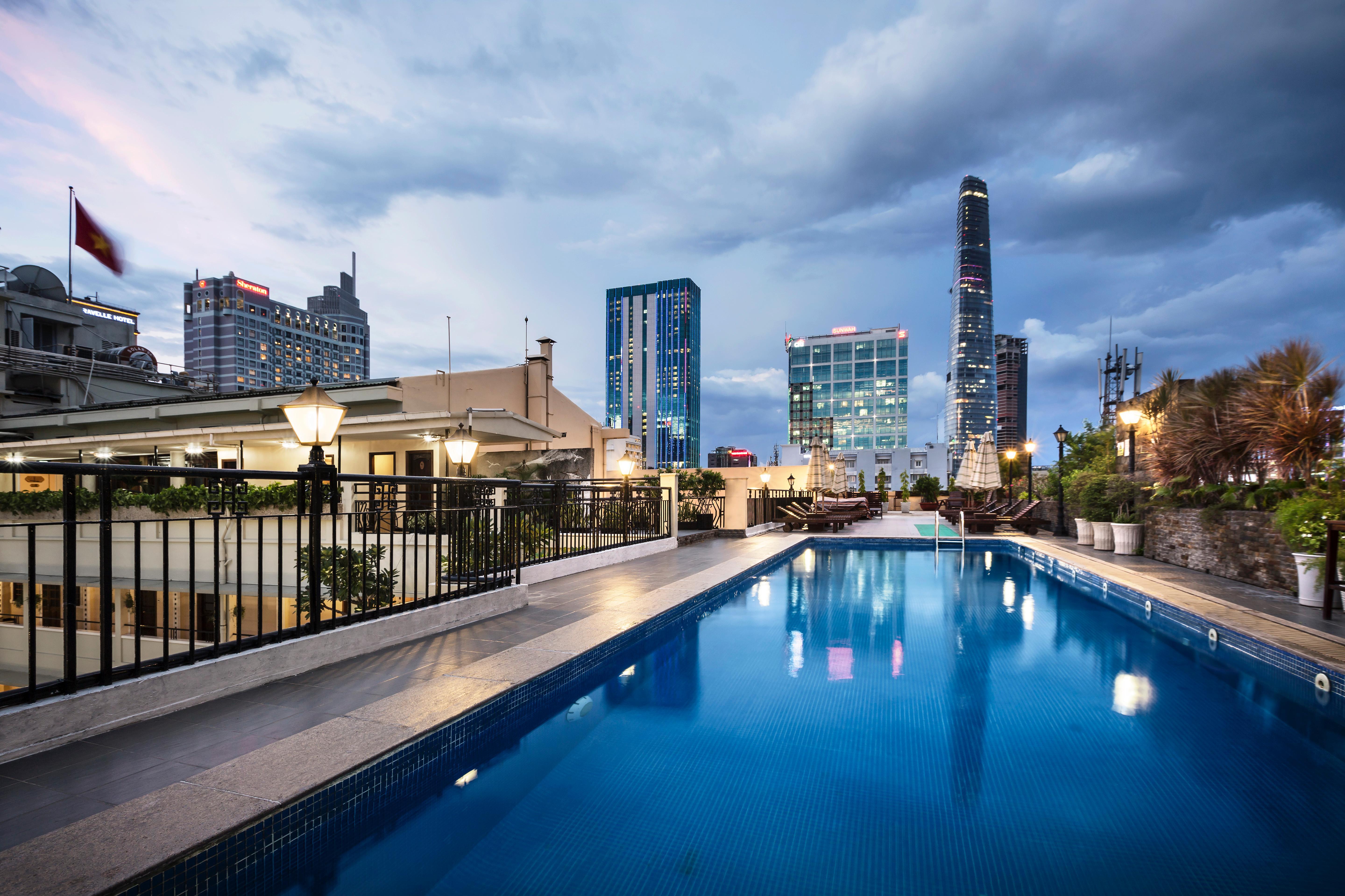 Rex Hotel Ho Chi Minh City Exterior photo The pool at the rooftop of the hotel