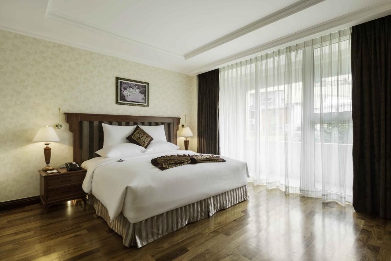 Rex Hotel Ho Chi Minh City Exterior photo A bedroom at the hotel